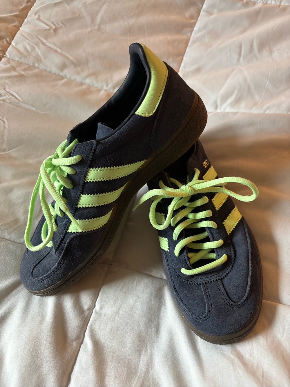 Adidas’s Spezial Navy Sneakers with Neon Yellow Stripes